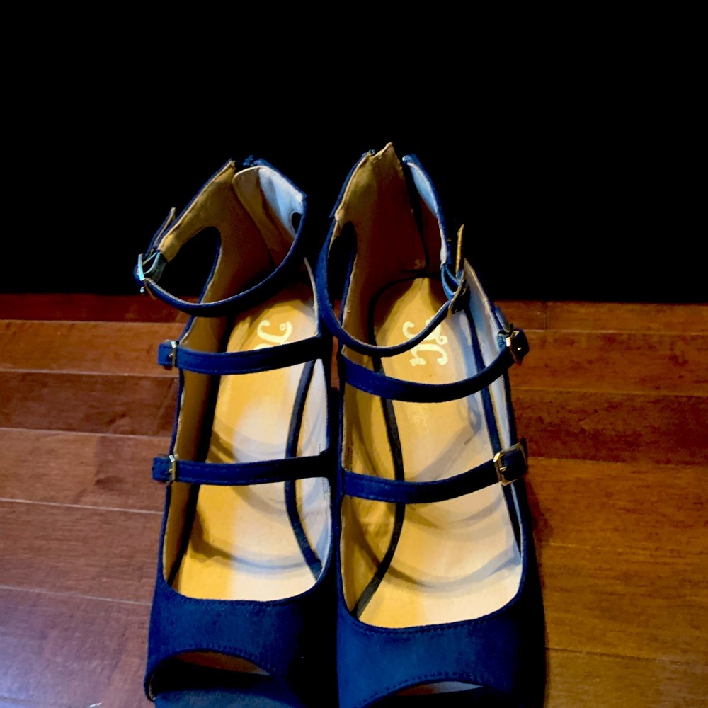 Sexy blue zipper up shoe.